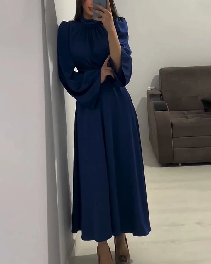 Long dress with a high neck and elegant bell sleeves