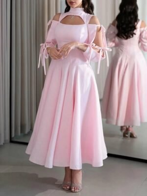 Pink midi dress with high neck and tied shoulders