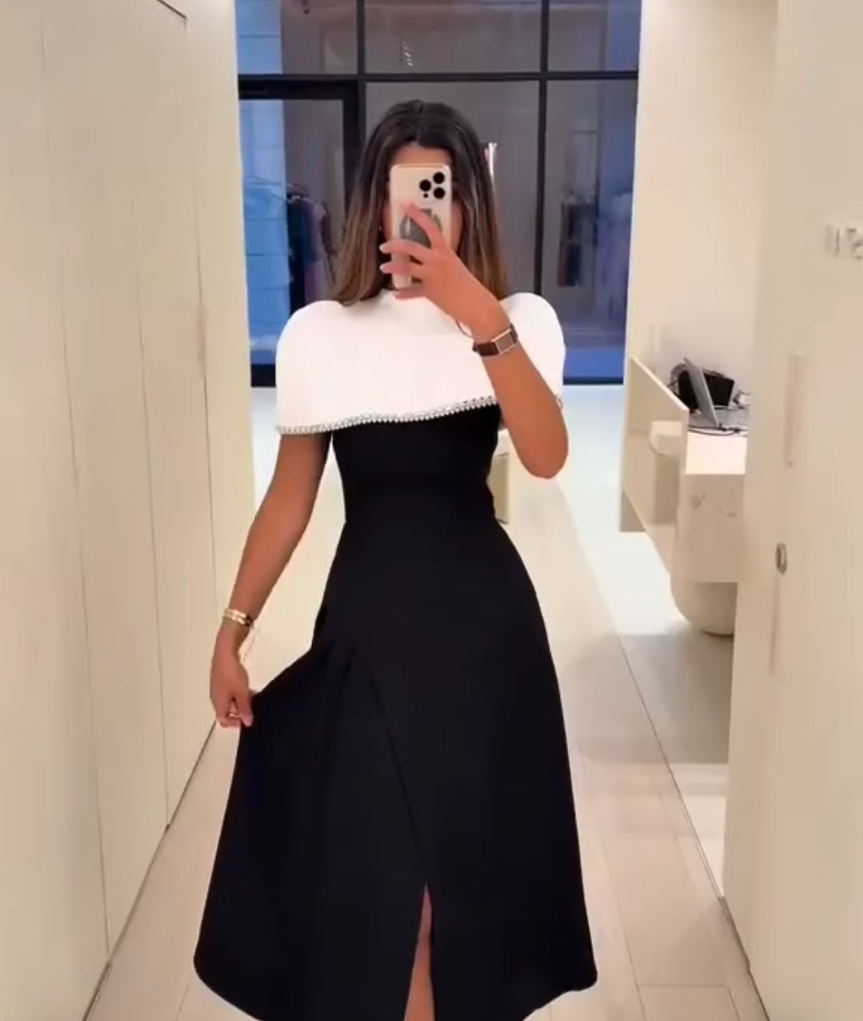 Black midi dress with white fluffy collar